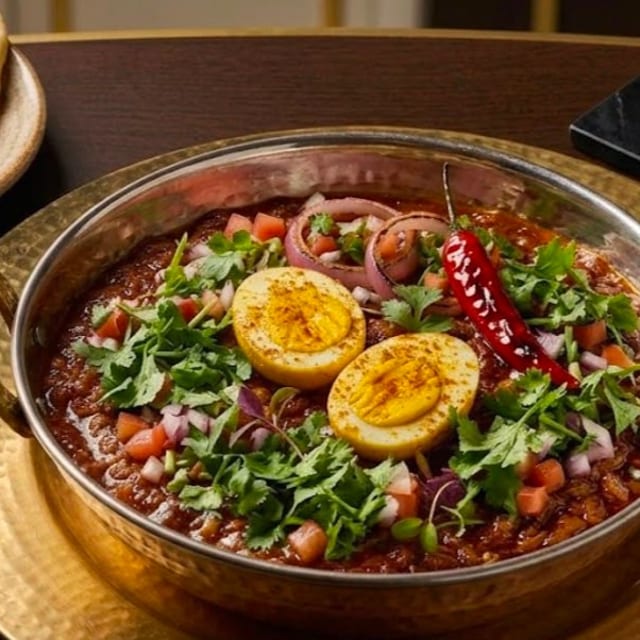 House Spiced Egg Masala.